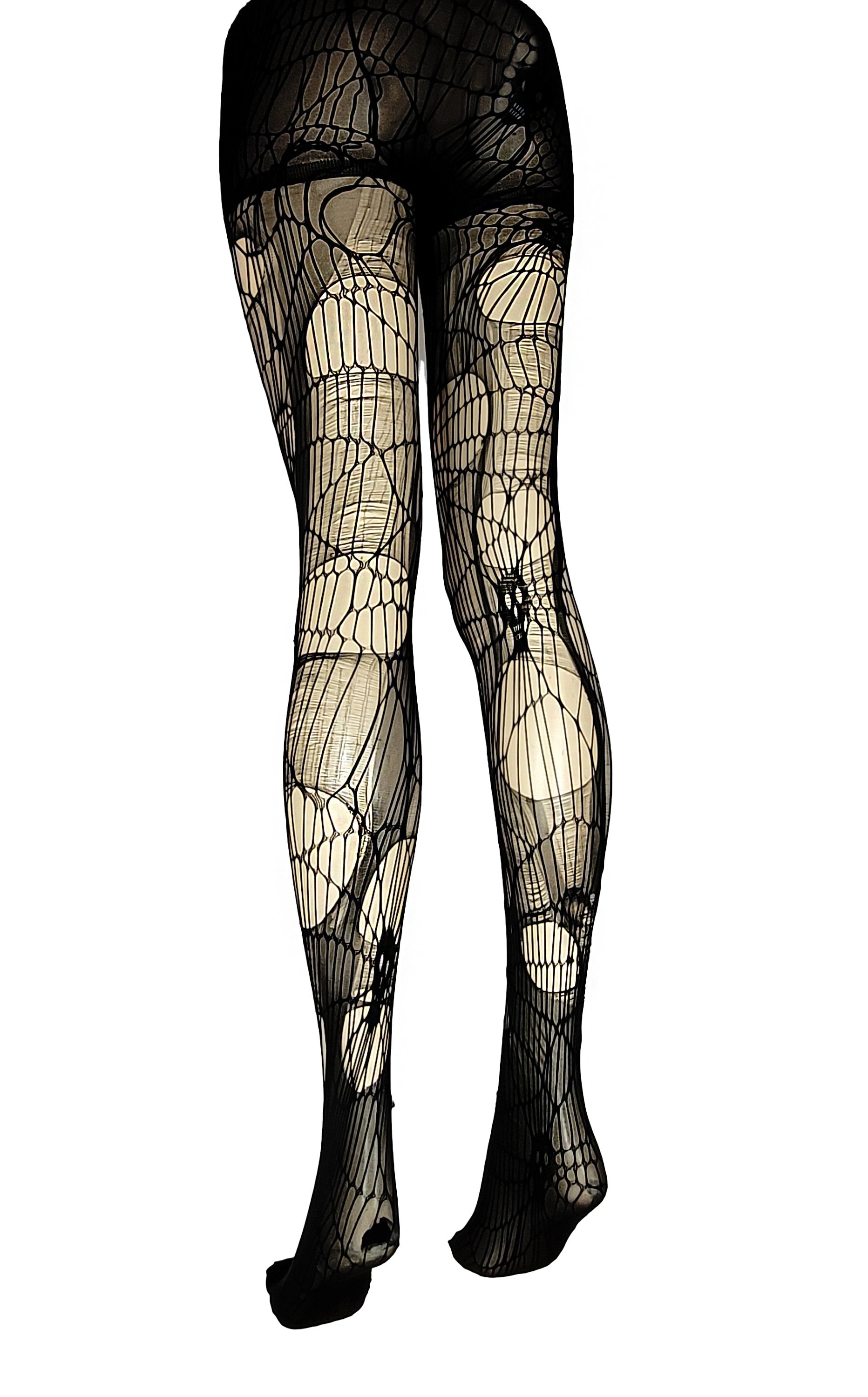 May include: Black fishnet tights with a large, geometric pattern.