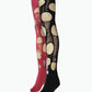 May include: A pair of footed tights featuring a split-color design with one leg in solid magenta and the other in solid black. Both legs are decorated with large, circular cutouts that reveal a fine, integrated black fishnet mesh fabric.