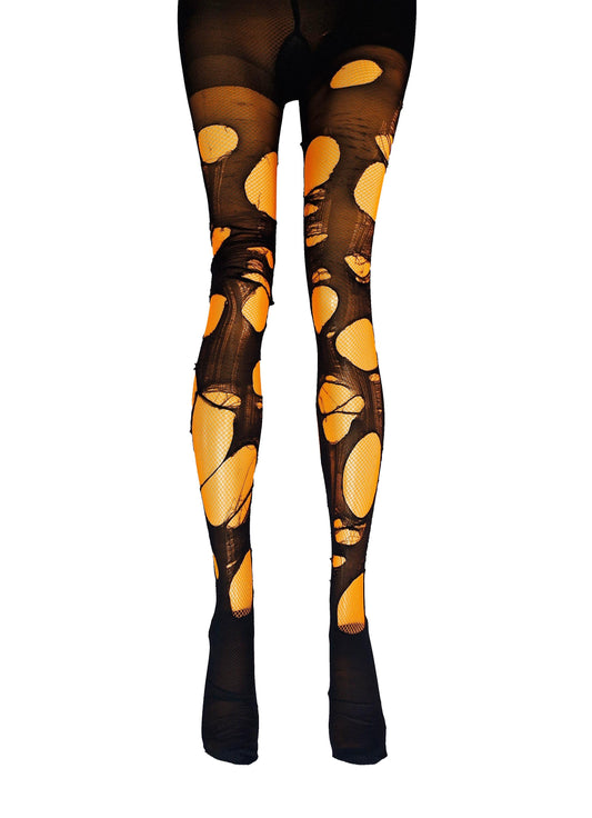 May include: Black fishnet tights with large, irregular holes revealing an orange underlay. The tights extend from the waist to the ankles, with the feet covered in solid black fabric. The overall effect is a distressed, edgy look.