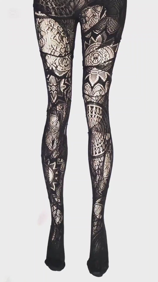 Video of Black witchy patterned fishnet tights