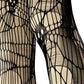 Tattered & torn fishnet tights | Webbed Skull