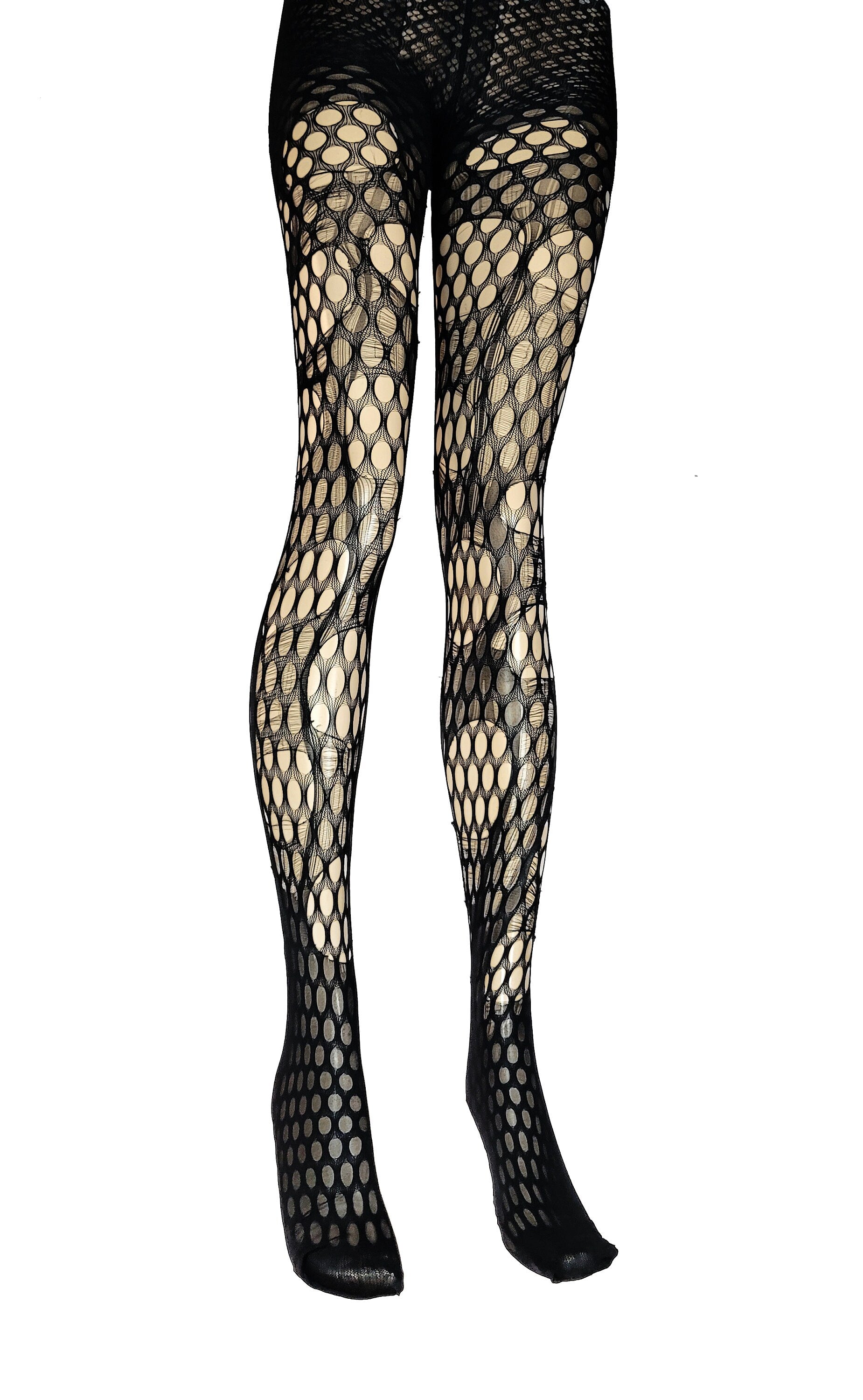 Large scale fishnet discount tights